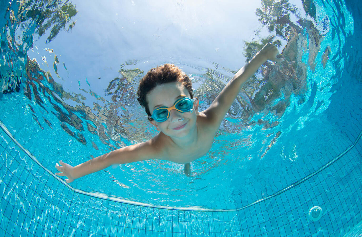 Child swimming in a residential pool